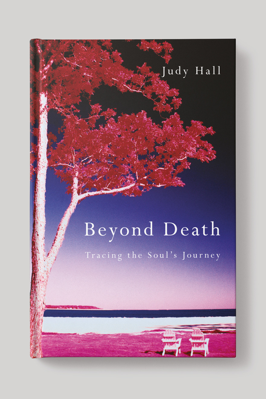 Front book cover to Beyond Death, showing a tree on a deserted beach with two empy deck chairs looking out upon the horizon